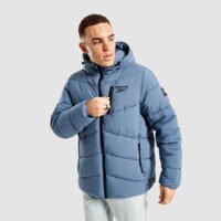 Męska kurtka zimowa REEBOK KURTKA ZIMOWA STRETCH PUFFER JACKET omrb1567_mineral blu kolor granatowy