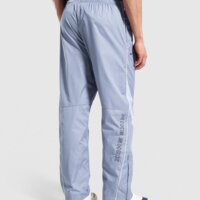 Spodnie męskie NIKE SPODNIE NSW WVN SHOX ih0653-493 kolor niebieski