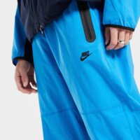 Spodnie męskie NIKE SPODNIE M NK TCH WVN PNT OS hv6515-435 kolor niebieski