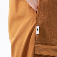 Spodnie damskie PUMA SPODNIE PUMA INFUSE WOVEN PANTS 536106-74 kolor żółty