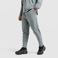 Spodnie męskie NIKE SPODNIE M NK DF UNLIMITED PANT TPR fb7548-084 kolor szary