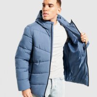 Męska kurtka zimowa REEBOK KURTKA ZIMOWA STRETCH PUFFER omrb1567_mineral blu kolor granatowy