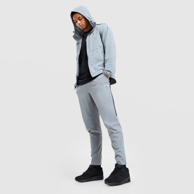 NIKE SPODNIE M NSW AIR MAX TC ST WVN PANT