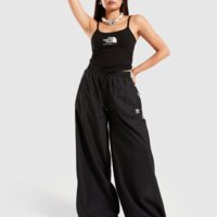 Top damski THE NORTH FACE TOP TECH SHINE SLIM TANK BLK nf0a8cbxjk31 kolor czarny