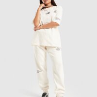 Koszulka damska THE NORTH FACE T-SHIRT OVERSIZE LOCATION nf0a8f7vqli1 kolor beżowy