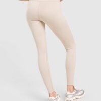 Spodnie damskie NIKE LEGGINGS ONE DRI-FIT SEAMLESS HIGH RISE GLS iu3943-236 kolor beżowy