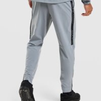 Spodnie męskie NIKE SPODNIE NSW AIR MAX TC ST WVN if0385-065 kolor szary