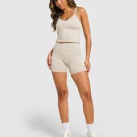 Top damski NIKE BRA W NK INDY BRA TANK GLS iw1606-236 kolor beżowy