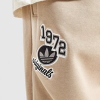 Spodnie męskie ADIDAS SPODNIE GB PNT GRAPHIC BADGE iz0009? kolor beżowy