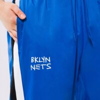 Spodnie damskie NIKE SPODNIE BKN W NK TRKST PANT CTS CE NBA do0129-463 kolor niebieski