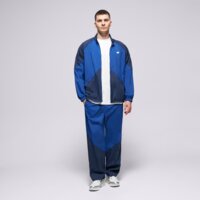 Męska kurtka przejściowa NEW BALANCE KURTKA ORTALION SPORT LEGACY JACKET mj61j73ynny kolor granatowy