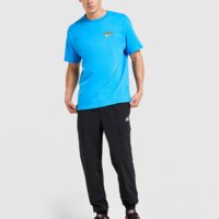 Koszulka męska NIKE T-SHIRT U NSW TEE M90 OC LG GFX SEGB hq9256-406 kolor niebieski